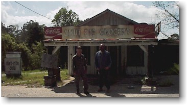 Major Cox, resident, and Dalton Kuder, visitor, at the Smuteye Gro.