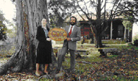 The Coxes in front of the Big House circa 1987 with Gate Sign